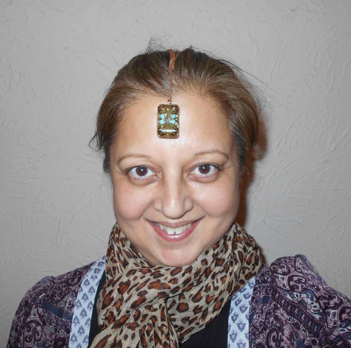 Neelu with crystal on forehead